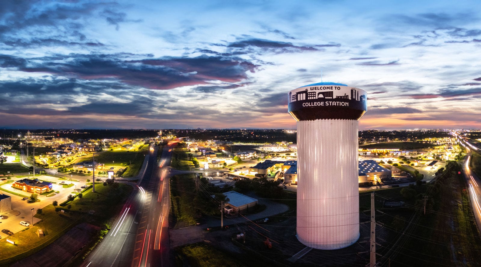 College Station water storage tower at dusk